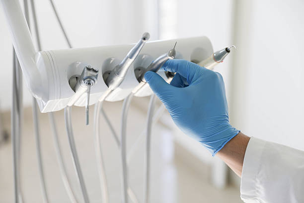 Professional Tooth Extraction technician working in Mount Airy, GA